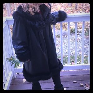 Leather coat with fur trim